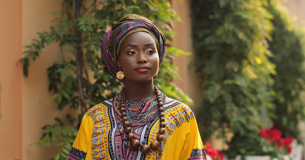 Close up of the face of the pretty young African woman 