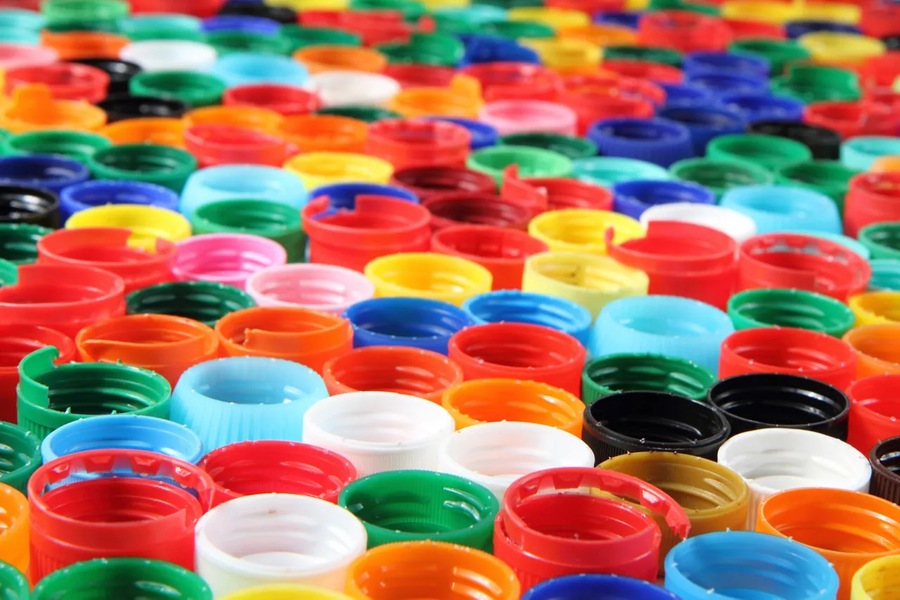 Colorful plastic caps as nice recycle background