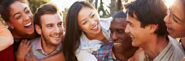 Group Of Friends Having Fun Together Outdoors