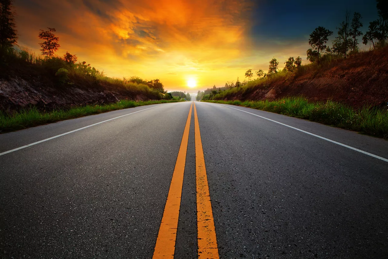 beautiful sun rising sky with asphalt highways road in rural scene use land transport and traveling background, backdrop.