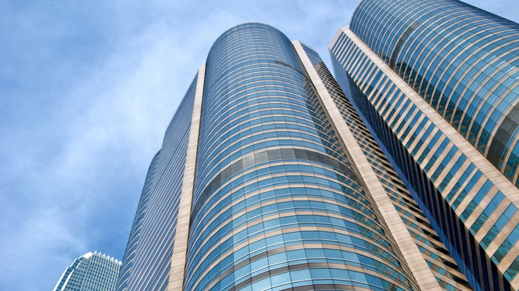 Exchange square and International Finance Center 2(the back), with Hong Kong and Chinese flags