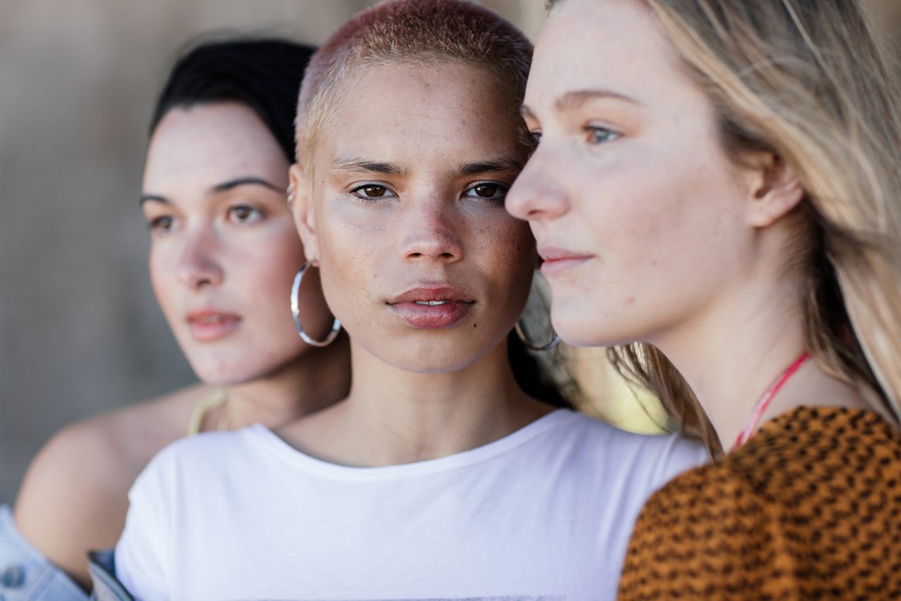 Beauty shot of girlfriends focusing on different thoughts and ideas