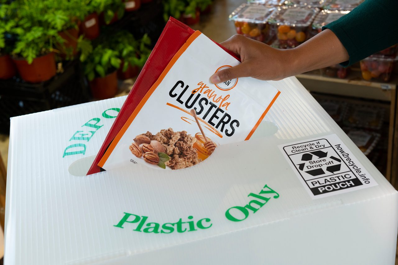 Food packaging going into a recycle bin