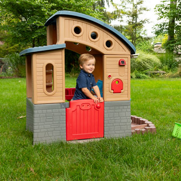 Playhouse exterior – child playing inside