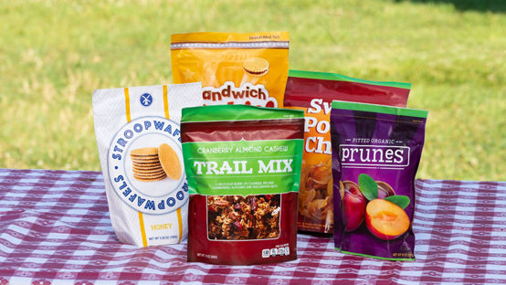 Snack bags on a picnic blanket 