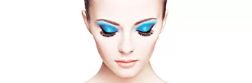 Beautiful woman face with blue eye shadow