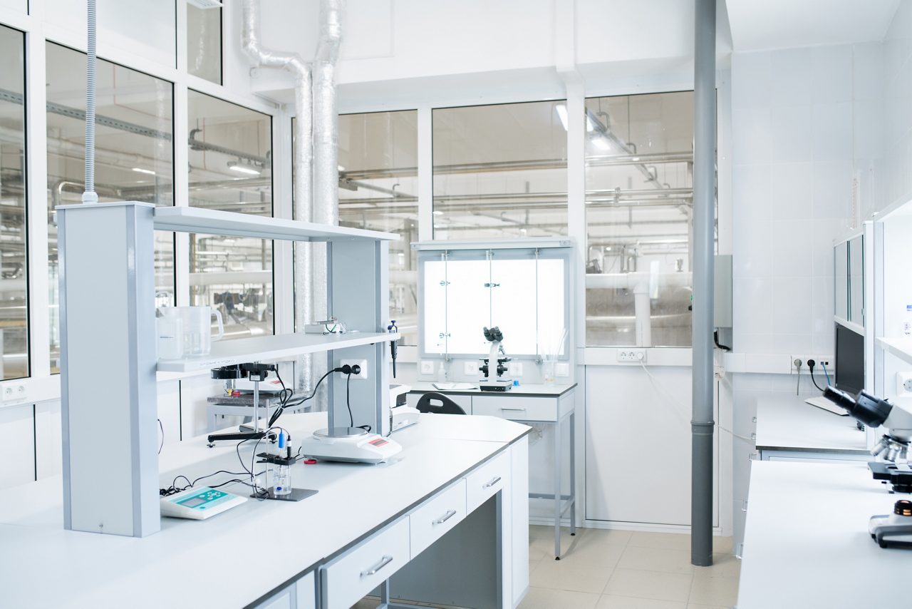 Interior of empty  science laboratory with modern equipment, copy space