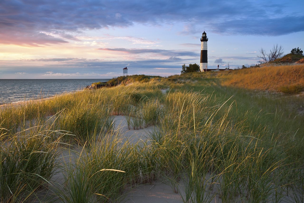 Big Sable Point Lighthouse. Image of the Big Sable Point Lighthouse and the Lake Michigan shoreline, Michigan, USA.; Shutterstock ID 108724388; PO: redownload; Job: redownload; Client: redownload; Other: redownload