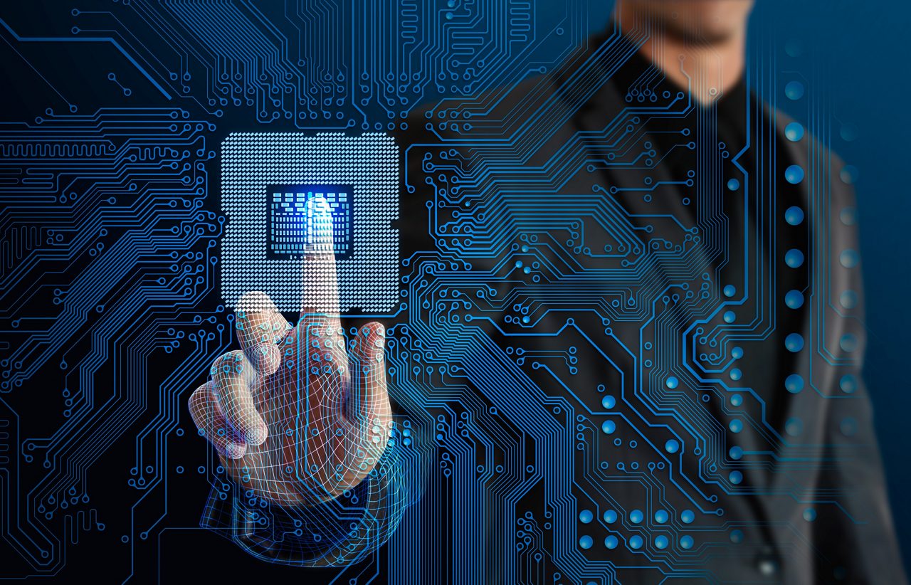 Employee touching glow CPU and electronics circuit