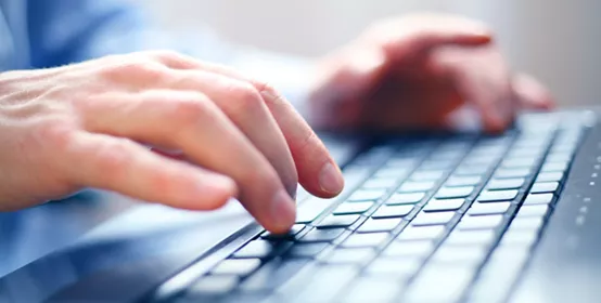 Image of man's hands typing. Selective focus; Shutterstock ID 95538487; PO: redownload; Job: redownload; Client: redownload; Other: redownload