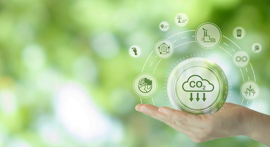 Reduction of carbon emissions, carbon neutral concept. Net zero greenhouse gas emissions target.
Reducing carbon footprint concept.
Decreasing CO2 emissions target symbol on green view background.