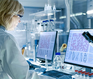Biopharm_lab_woman_microscope.jpg