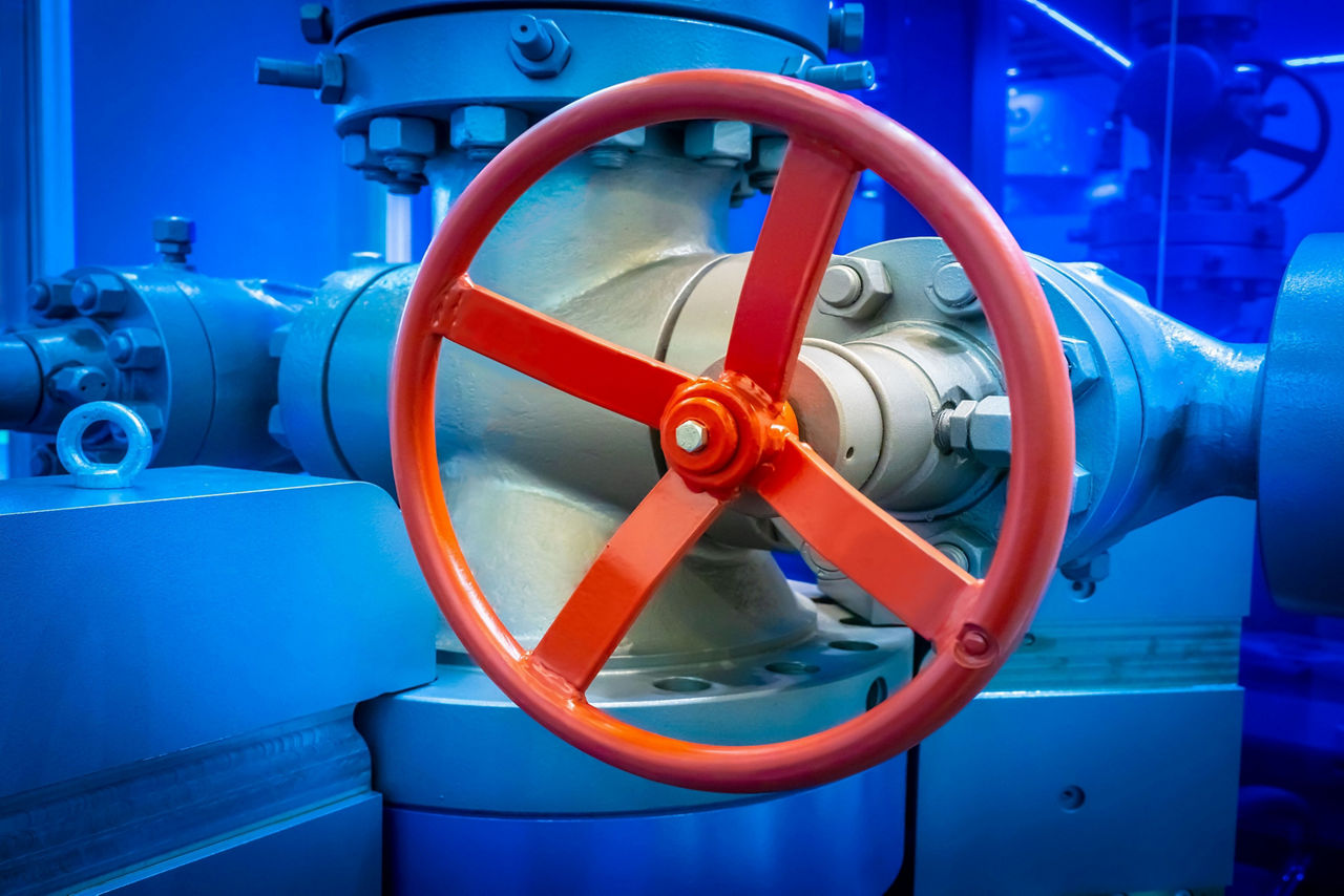 Compressor station. Industrial equipment. Yellow pipes. Valve on the pipe. Energy. Industrial concept. Gas. Liquefied gas.