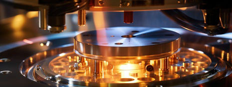 A closeup shot of a chemical vapor deposition CVD chamber, which is used to deposit thin films of material onto the wafer surface. The image showcases the inside of the chamber, filled with  