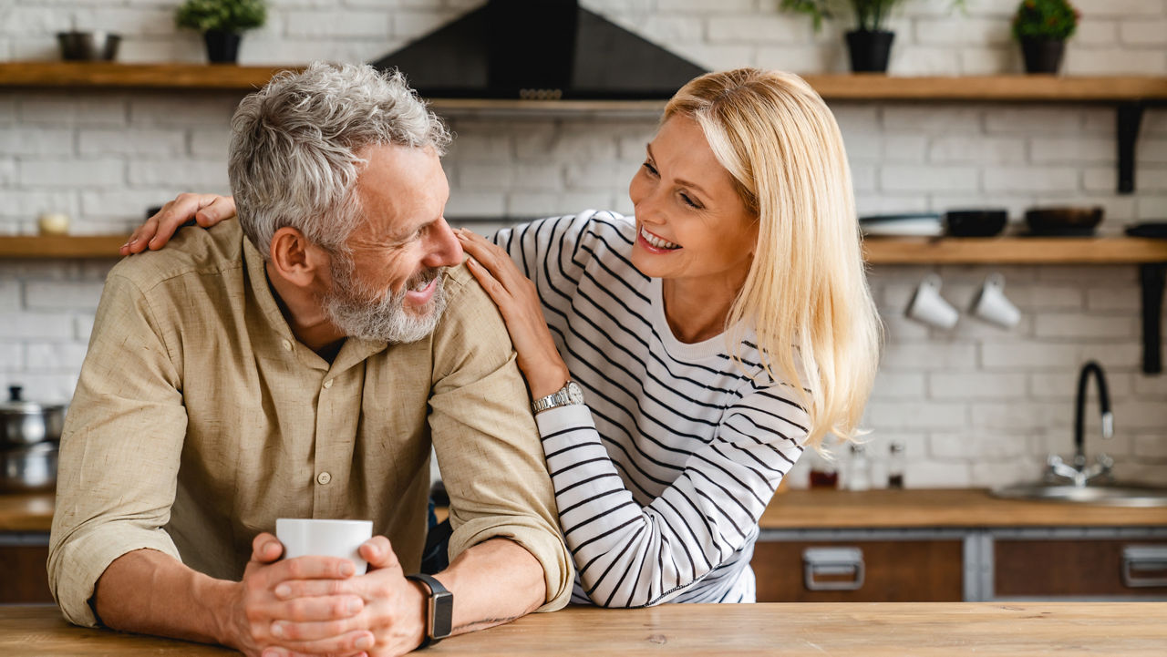 Cheerful senior couple enjoying life and fun together