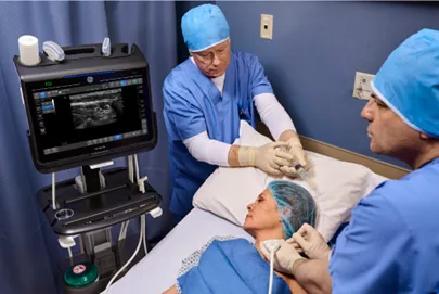 Doctor using Venue Go to assess a patient