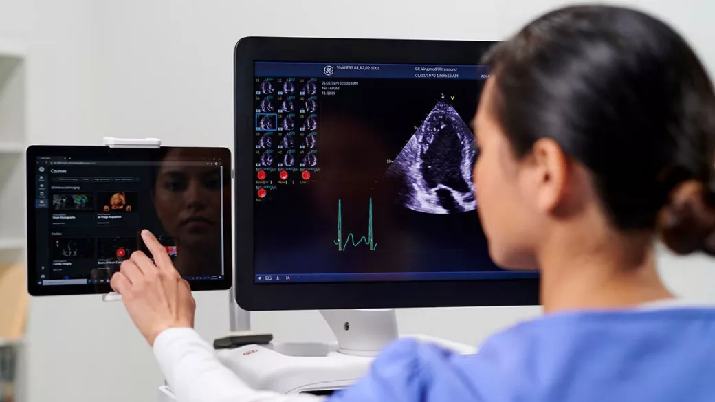 medical professional using a GEHC ultrasound machine