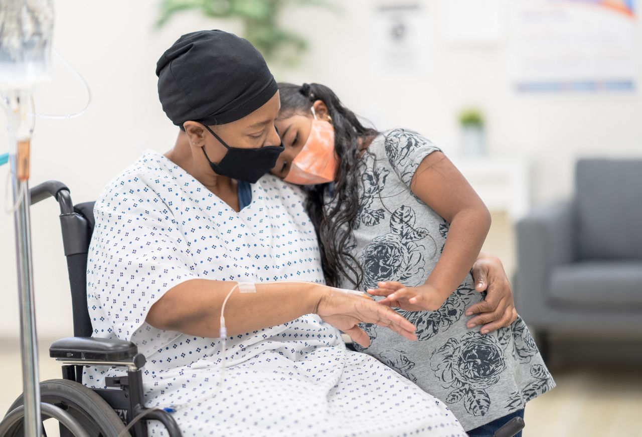 Mother_With_Cancer_and_Her_Daughter_Stock_Photo