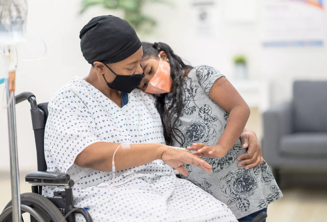 Mother_With_Cancer_and_Her_Daughter_Stock_Photo