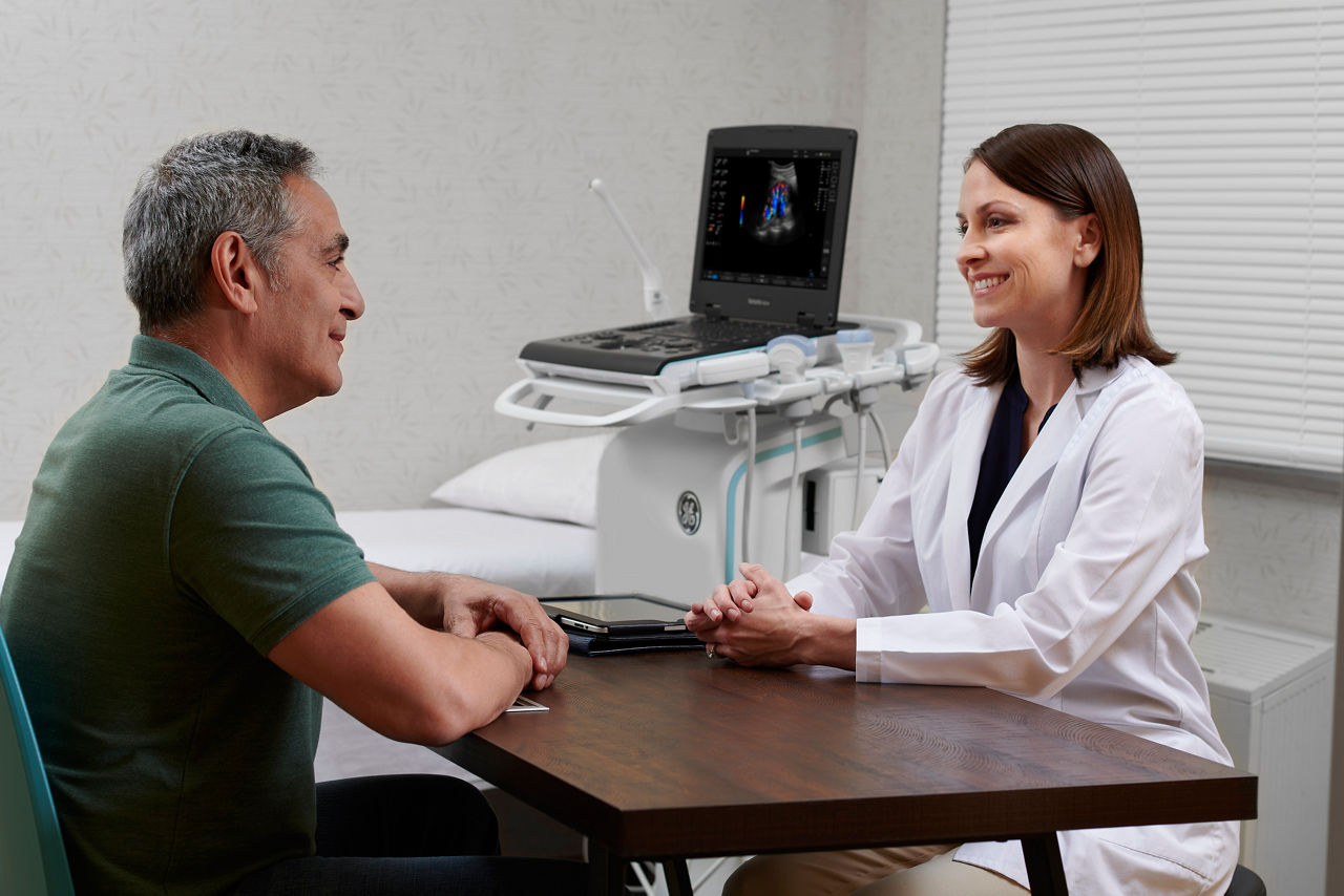 Urologist assisting Urology patient
