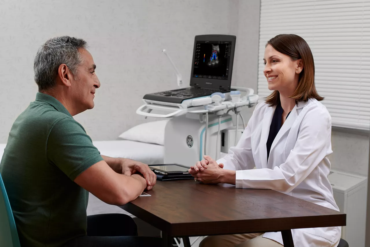 Urologist assisting Urology patient