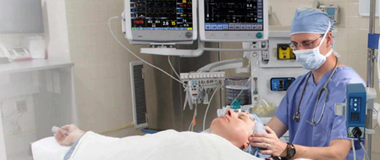 Healthcare worker administering anaesthesia