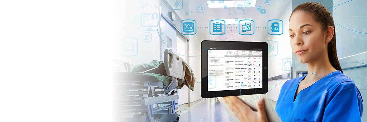 health professional using a tablet in hospital setting