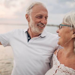 Elderly couple on beach