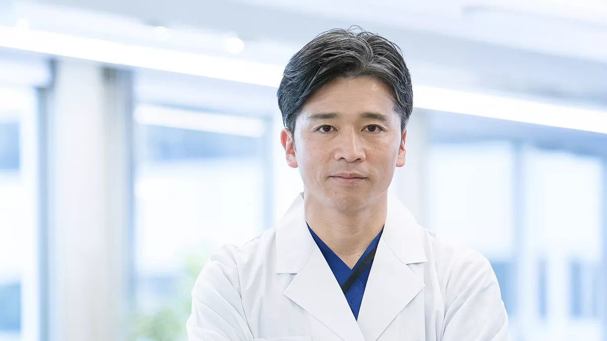 Doctor looking outside