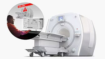 Imaging machine with a cut out showing someone working at a computer