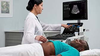 Clinician holding a patient's hand