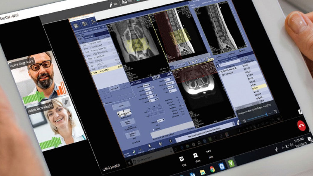 Radiologist reviewing a patient's x-ray and image information using Digtial Expert Access