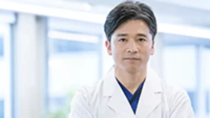 Doctor looking outside