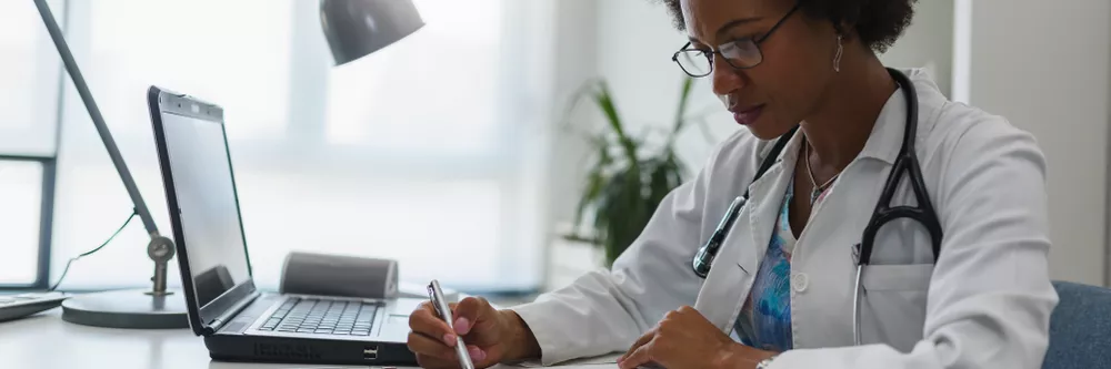 doctor-reviewing-paperwo