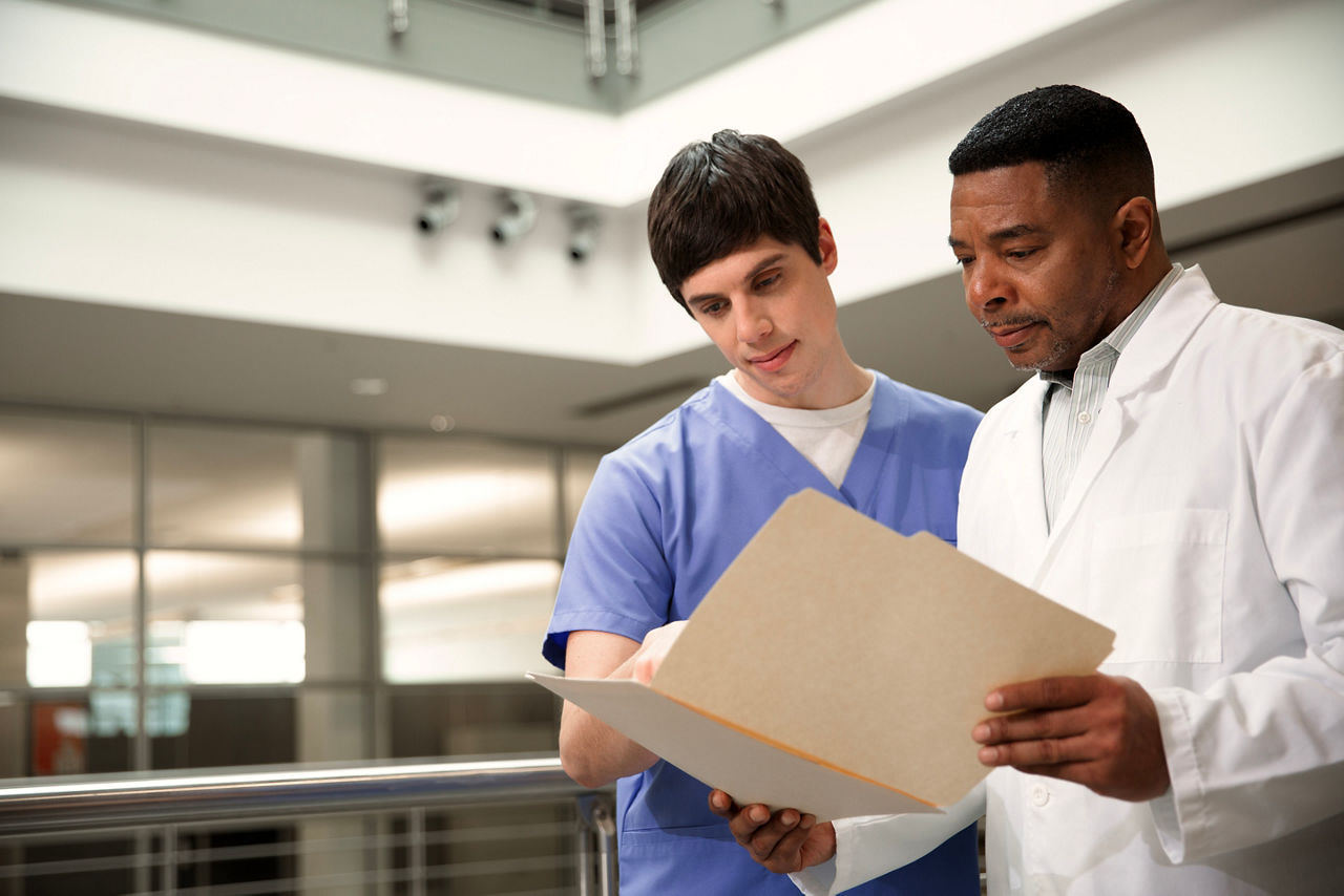 driving-consistency-radiologist-and-technologist-reviewing-st-en