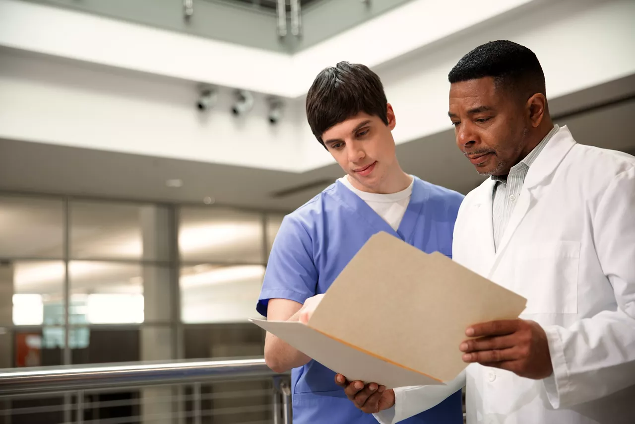 driving-consistency-radiologist-and-technologist-reviewing-st-en