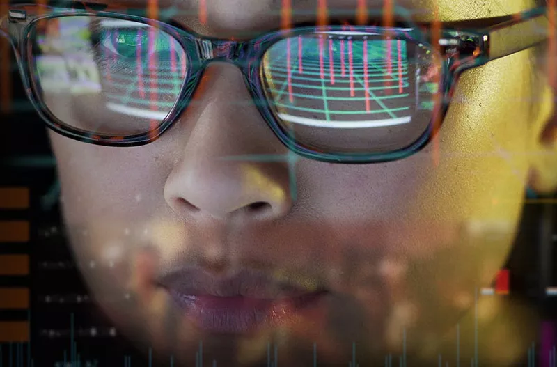 Person looking at a screen which contains a view of the robust cybersecurity program