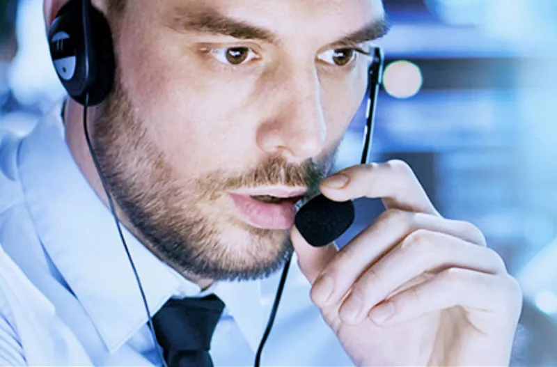 Man providing technical support on a headset