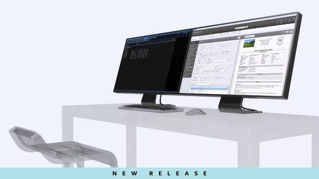 Two computer monitors on a desk showing ultrasound machine analysis