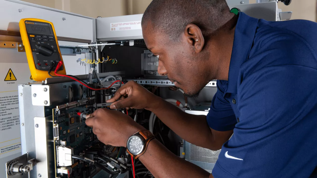 technician servicing equipment