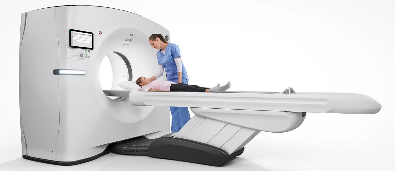 Radiology tech with pediatric patient CT scan
