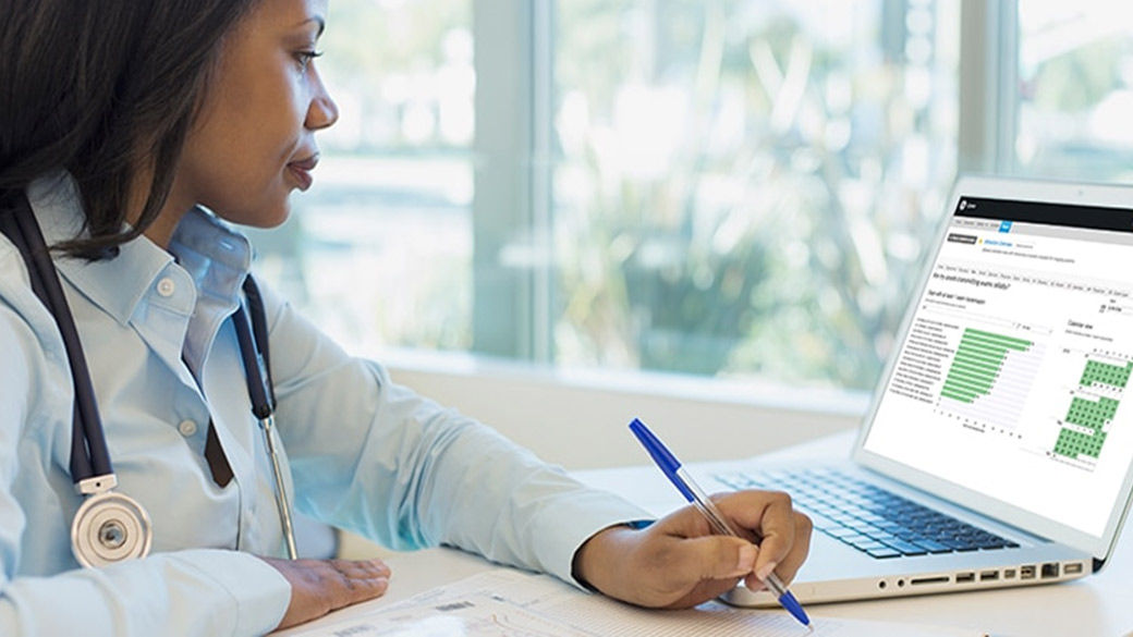 Doctor assessing patient using Venue technology