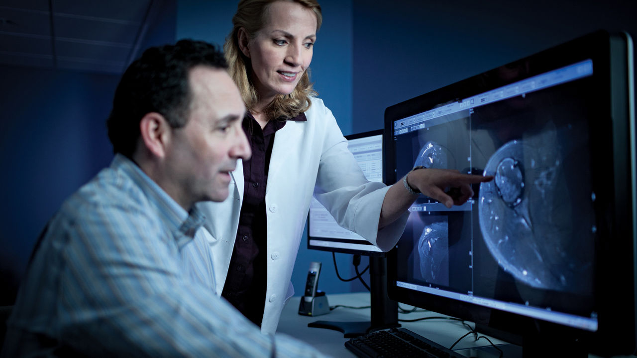 Interoperability-Doctor-looking-at-scan