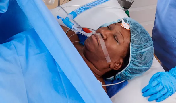 Patient in surgery with a breathing tube