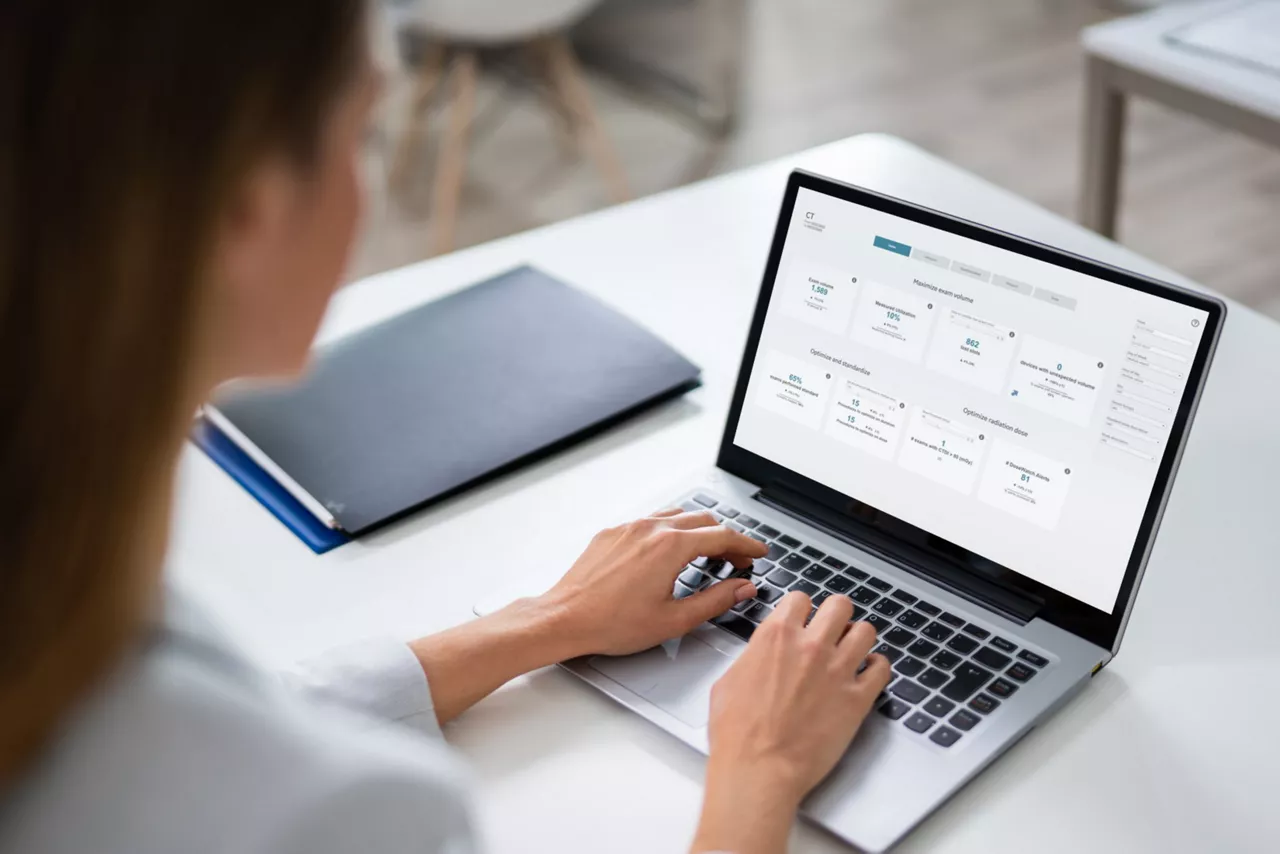 Clinician on laptop