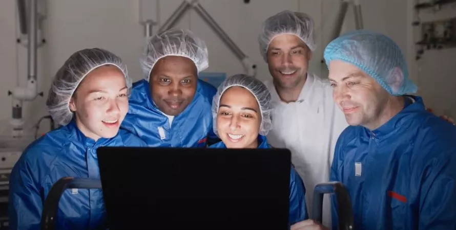 A group of healthcare professionals awaiting the results of tracer production
