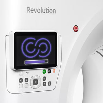 Image of a CT machine with a closeup of a screen using the Smart Subscription service.