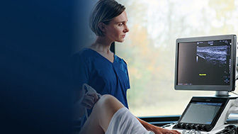 Clinician giving a knee ultrasound