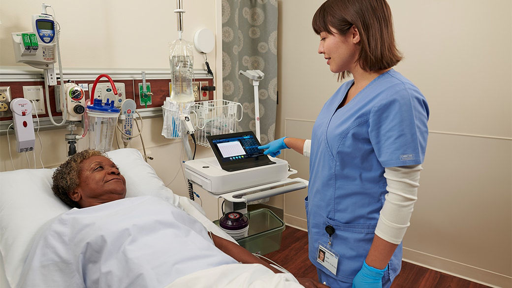 Clinician talking with a patient,