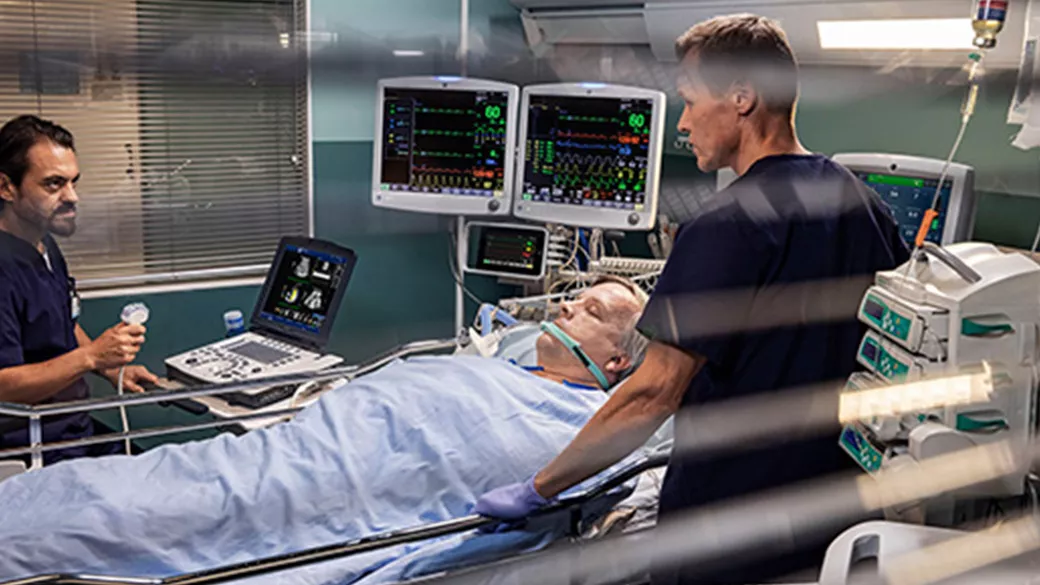 Clinicians caring for a patient.